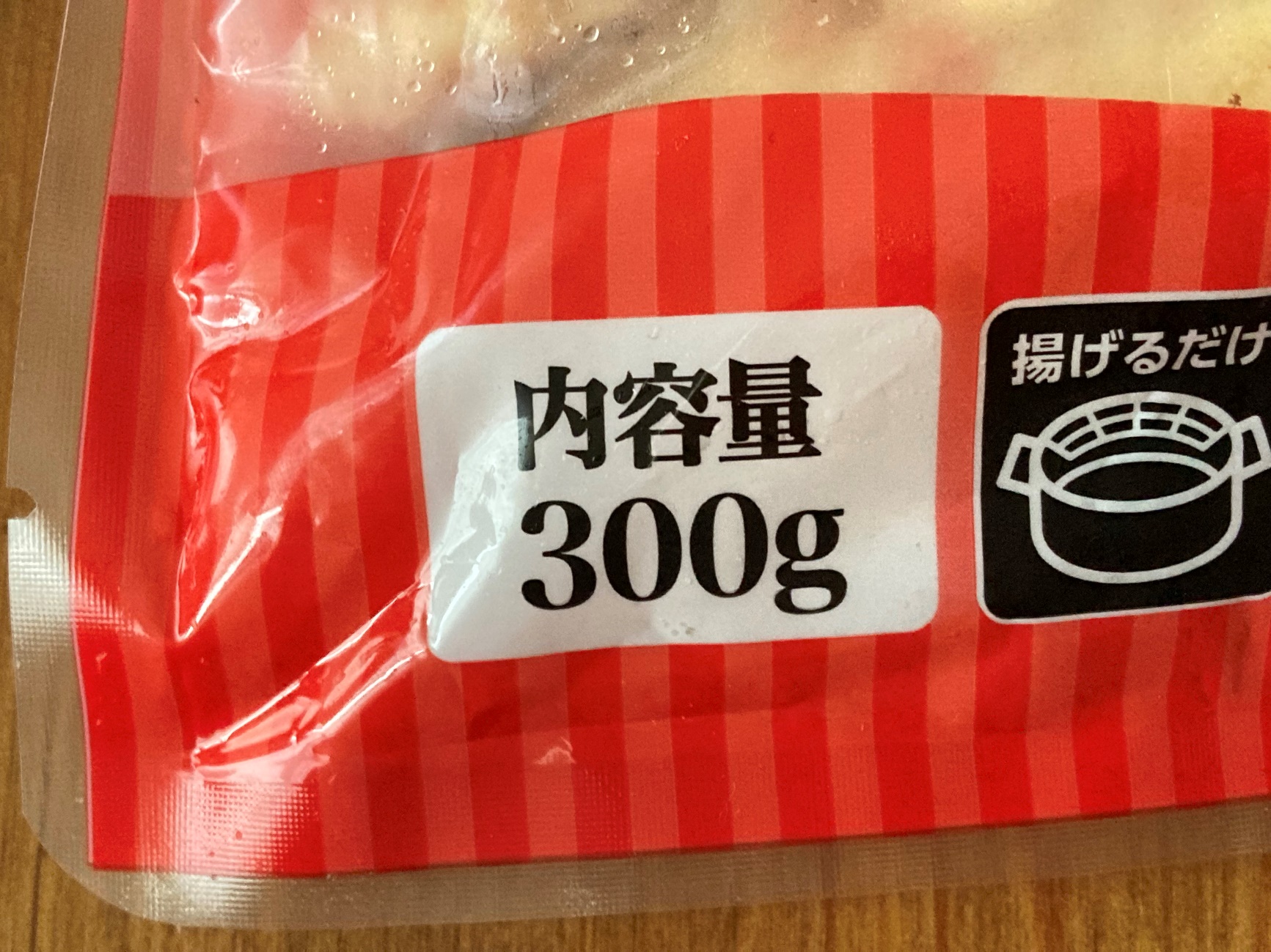 業務スーパーのかにかま棒身天ぷらの内容量300gの表記